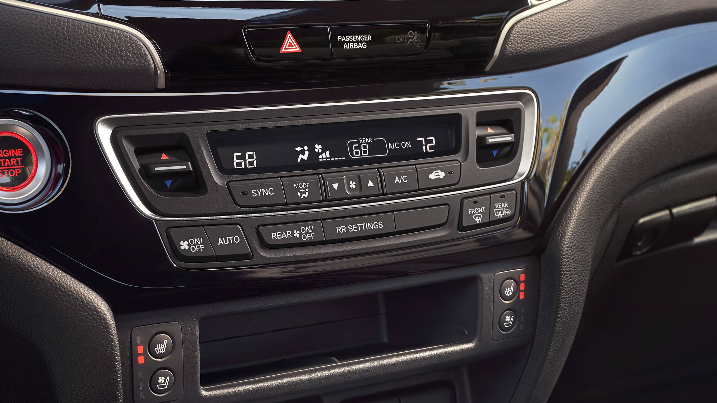 Tri-zone climate control detail on the 2019 Honda Passport Elite with Black Leather interior.